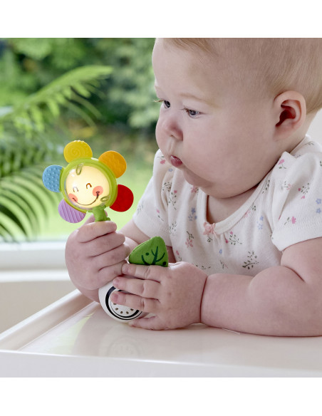 Sonajero de flor agita y brilla