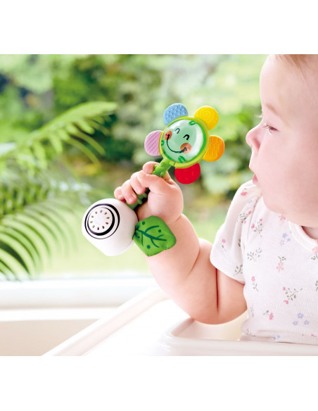 Sonajero de flor agita y brilla